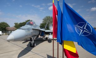 a_cf-188_fighter_jet_of_the_royal_canadian_air_force_on_display_during_the_ceremony_at_mihail_kogalniceau_airbase_romania
